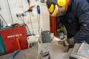 Person doing Industrial Blasting - KMA Shot Blasting